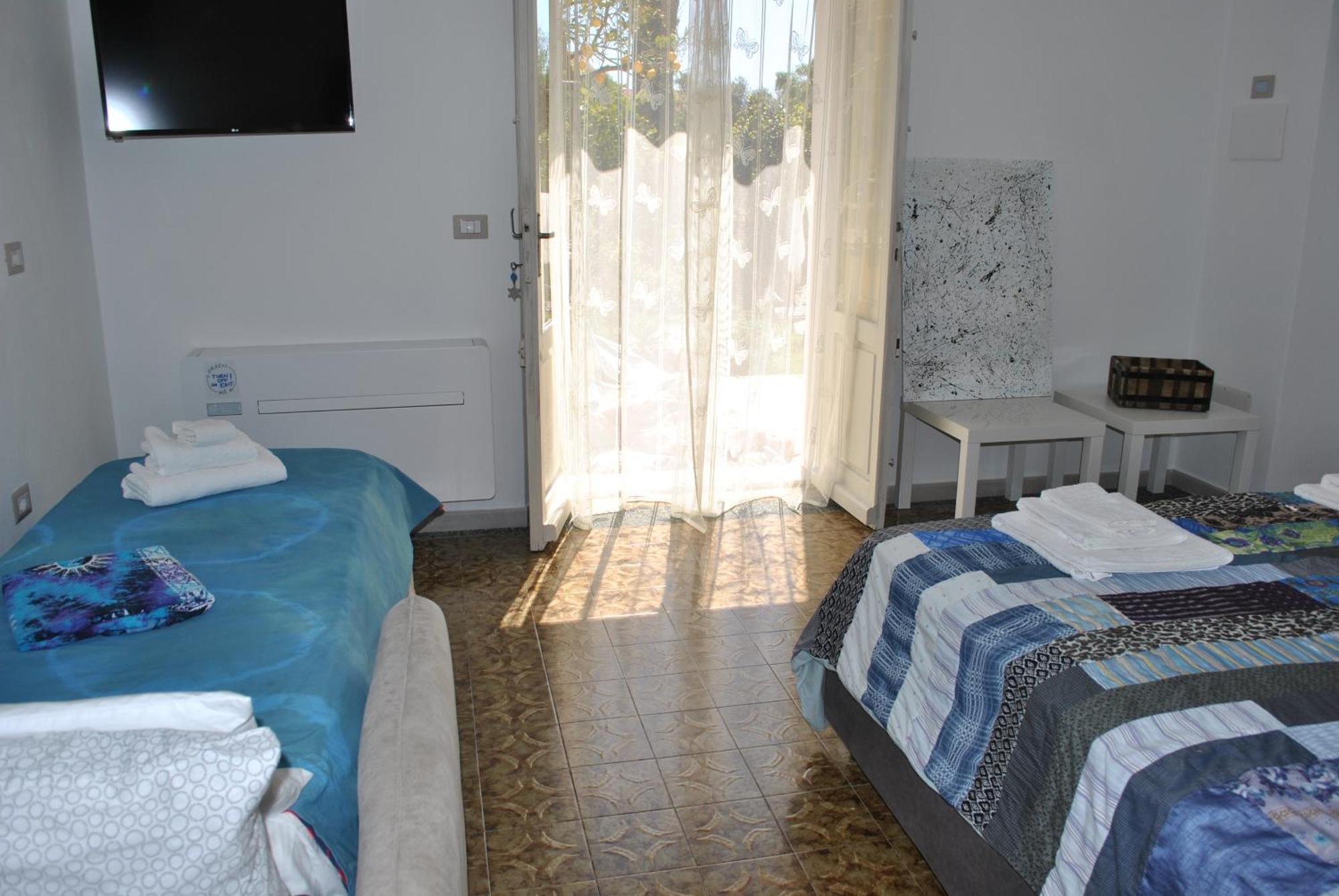 Il Giardino Di Tatiana Rooms & Breakfast La Maddalena Szoba fotó
